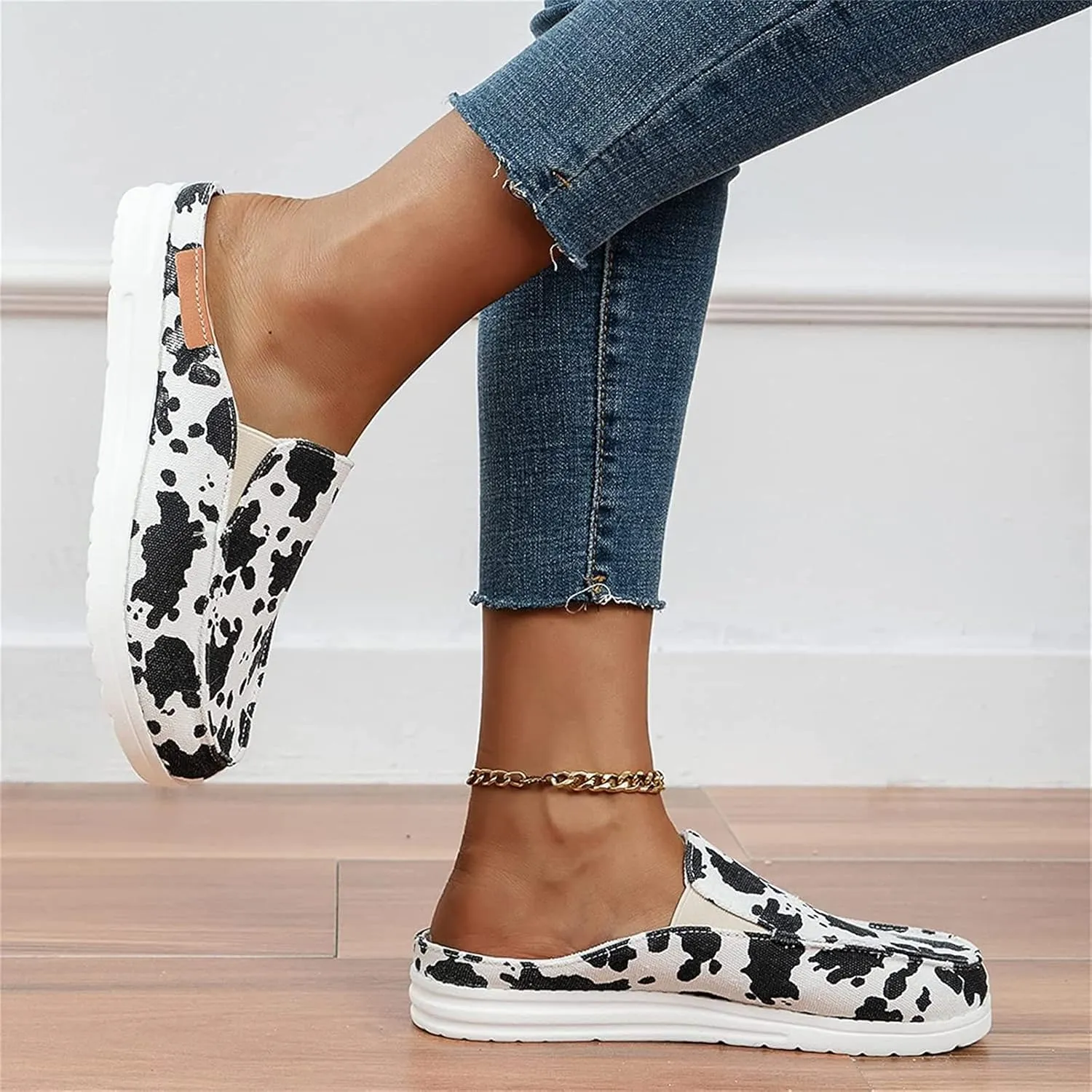 DOIX Women's Flat Mules Closed Toe Canvas Flat Clogs Sandals Backless Slip on Slides Loafer Shoes Garden Shoes Summer Boat Shoes Walking Slippers,Cow Print,US10/EU41