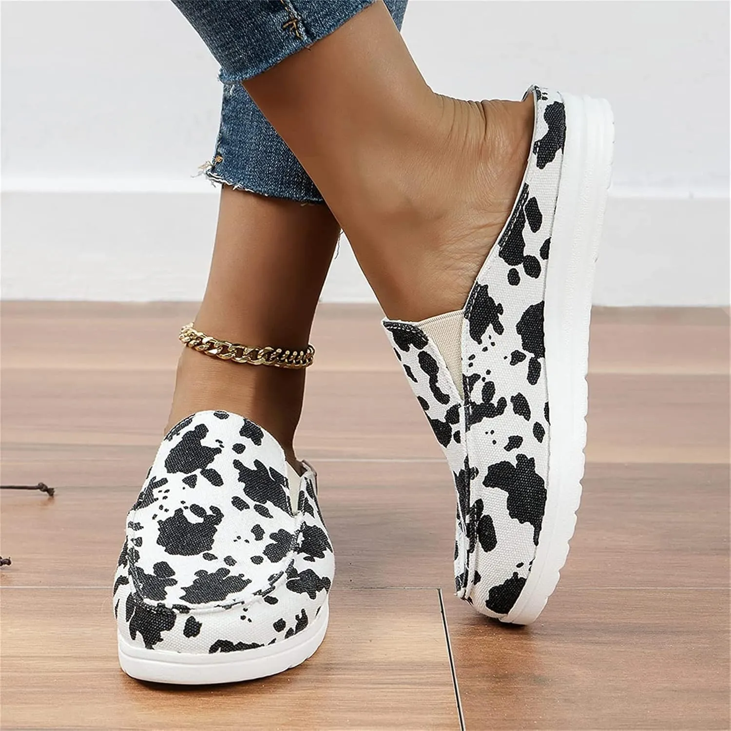 DOIX Women's Flat Mules Closed Toe Canvas Flat Clogs Sandals Backless Slip on Slides Loafer Shoes Garden Shoes Summer Boat Shoes Walking Slippers,Cow Print,US10/EU41