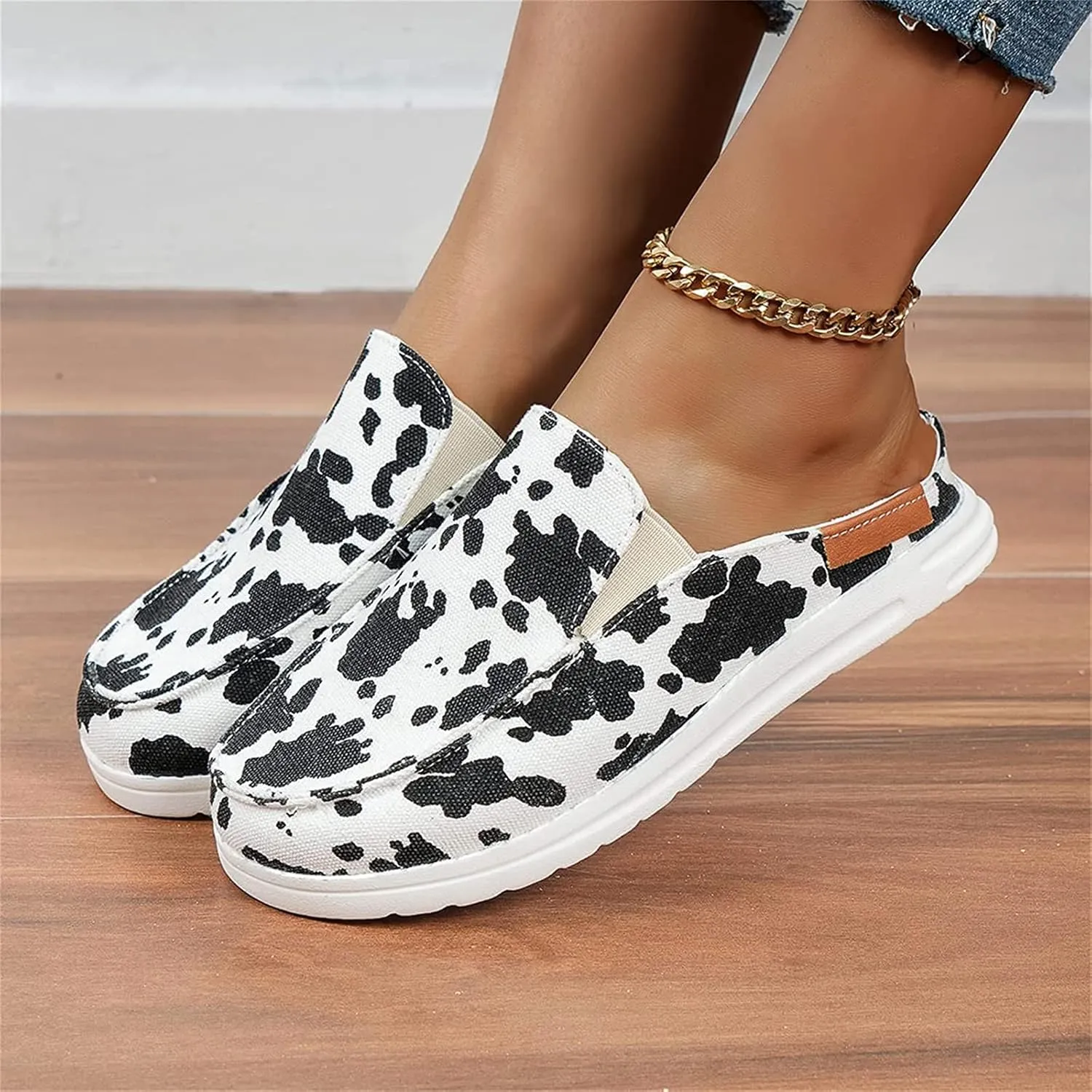 DOIX Women's Flat Mules Closed Toe Canvas Flat Clogs Sandals Backless Slip on Slides Loafer Shoes Garden Shoes Summer Boat Shoes Walking Slippers,Cow Print,US10/EU41